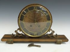 Drum cased mantel clock c1930s with Roman chapter ring and two train movement striking on a gong