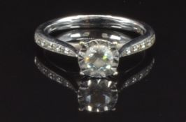 A 9ct white gold ring set with diamonds totalling approximately 0.4ct, size K, 2.6g