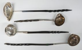 Four various whalebone handled toddy ladles, one being London 1807, maker's mark indistinct, another