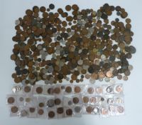 An amateur collection of UK and overseas coinage, 18thC token, George III etc, in a vintage