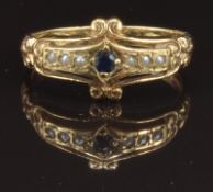 A 9ct gold ring set with a sapphire and seed pearls, size O, 2.8g