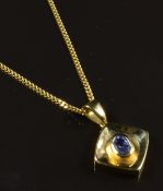 An 18ct gold pendant set with an oval cut tanzanite on 18ct gold chain, 6.2g, length 40cm