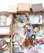 A collection of costume jewellery including vintage beads