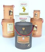 Seven Bell's whisky decanters in original boxes including 12 years aged, commemorative, wedding etc,