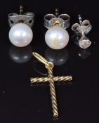 A pair of pearl earrings, a diamond earring and a yellow metal cross pendant