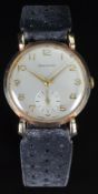 Garrard 9ct gold gentleman's wristwatch with inset subsidiary seconds dial, gold hands and Arabic