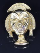 Franz Hirner 18ct gold pendant in the form of an African mask, 2.2 x 3.3cm, 10.5g