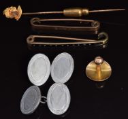 Two 9ct gold pins, 4.3g, a 9ct gold stud, 0.8g, a yellow metal stick pin set with a diamond and a