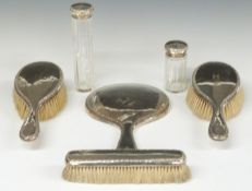 Six piece Edward VII hallmarked silver mounted dressing table set comprising mirror, three brushes