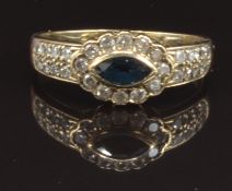A 9ct gold ring set with a marquise cut sapphire and diamonds, size P, 2.2g