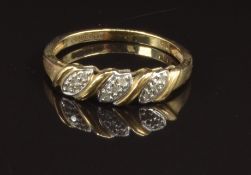 A 9ct gold ring set with diamonds, size Q, 2g