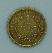 1853 gold U.S one dollar coin