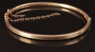 A 9ct rose gold bangle, 4.6g