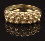 A 9ct gold keeper ring, size N, 2.5g