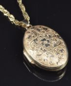 A 9ct gold necklace and a 9ct gold locket, 7g, length 66cm