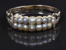 Georgian ring set with split pearls in two rows, engraved to inner band 'M A Callow the gift of