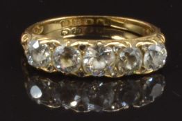 Edwardian 18ct gold ring set with five old cut diamonds and a further eight rose cut diamonds,