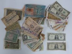 A collection of approximately 70 world banknotes, includes two USA silver $1 certificates