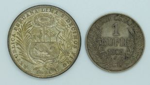 Wilhelm II 1905 German East African silver one Rupie, together with a 1928 Peru 1 sol