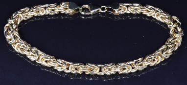 A 9ct gold bracelet made up of knotted links, 8.2g