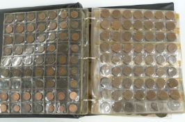 An amateur coin collection comprising UK coinage, some silver content, farthings etc, in album