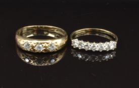 Two 9ct gold rings set with cubic zirconia, sizes R & O, 4.1g
