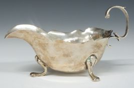Hallmarked silver sauce boat, raised on three feet, marks rubbed, length 14.5cm, weight 92g