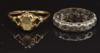 A 9ct gold ring (1.5g) and a 9ct gold and silver ring