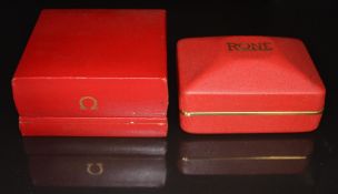 Two vintage watch boxes, one Omega the other Rone.