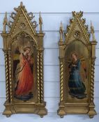 Pair of 19thC carved and gilt icons painted with winged angels, H64cm