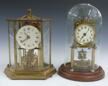 An early to mid 20thC anniversary clock, the movement numbered 94330, together with a c1960s Kundo