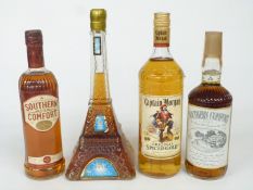 Two bottles of Southern Comfort, one 26 ⅔ fl oz 87 proof the other 70cl 35% vol, together with a