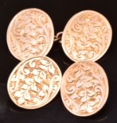 A pair of 9ct rose gold cufflinks with engraved chased decoration, Birmingham 1919, 5.4g