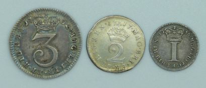 George III 1762 Maundy three pence and a Maundy penny 1786, together with a George I 1717 twopence