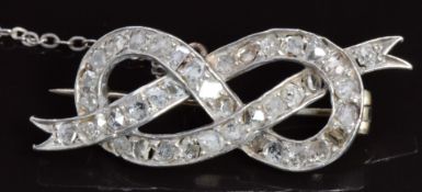 Victorian love knot brooch set with rose cut diamonds, 3.2 x 1.6cm, 4.1g