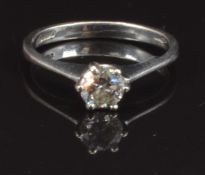 An 18ct white gold ring set with a round cut diamond of approximately 0.4ct, size M, 2.6g