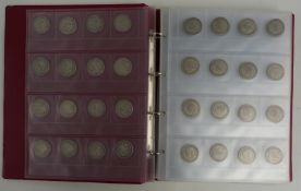 A collectors album containing UK half crowns, largely 1908-22, approximately 2570g in total