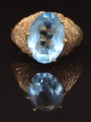 A 9ct gold ring set with a faux aquamarine, 5.8g, size N