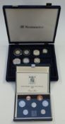 Six silver proof coins in a collector's case, together with a 1935 rocking horse crown and a 1985