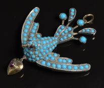 A Victorian gold and silver pendant in the form of a swallow