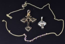 Two 9ct gold cross pendants, one set with diamonds and a 9ct gold necklace set with rubies, 6.1g