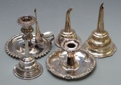 Two 19thC silver plated chambersticks, one by Matthew Boulton, and three wine funnels