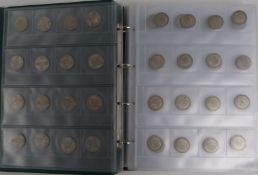 A collector's album containing a large number of UK florins 1915-1924, approximately 2185g