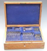 Early 20thC oak cased 12 place setting canteen of silver plated cutlery with ivorine plaque for John