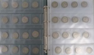 A collector's album containing a collection of UK half crowns 1939-46, approximately 1345g