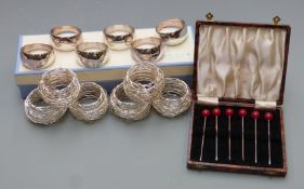 Newbridge silverware boxed set of six napkin rings, further set of six wirework napkin rings and a