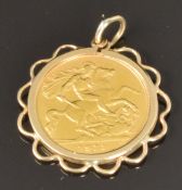 A 1911 gold half sovereign in 9ct gold pendant mount, 5.3g