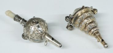 Two white metal baby's rattles, one with mother of pearl handle the other with gilt finish, length