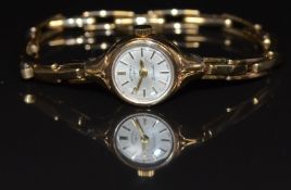 Rotary 9ct gold ladies wristwatch with gold hands and baton hour markers, silver dial and Swiss 21