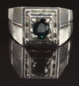 A 14k white gold ring set with an oval cut sapphire, size P, 6.5g